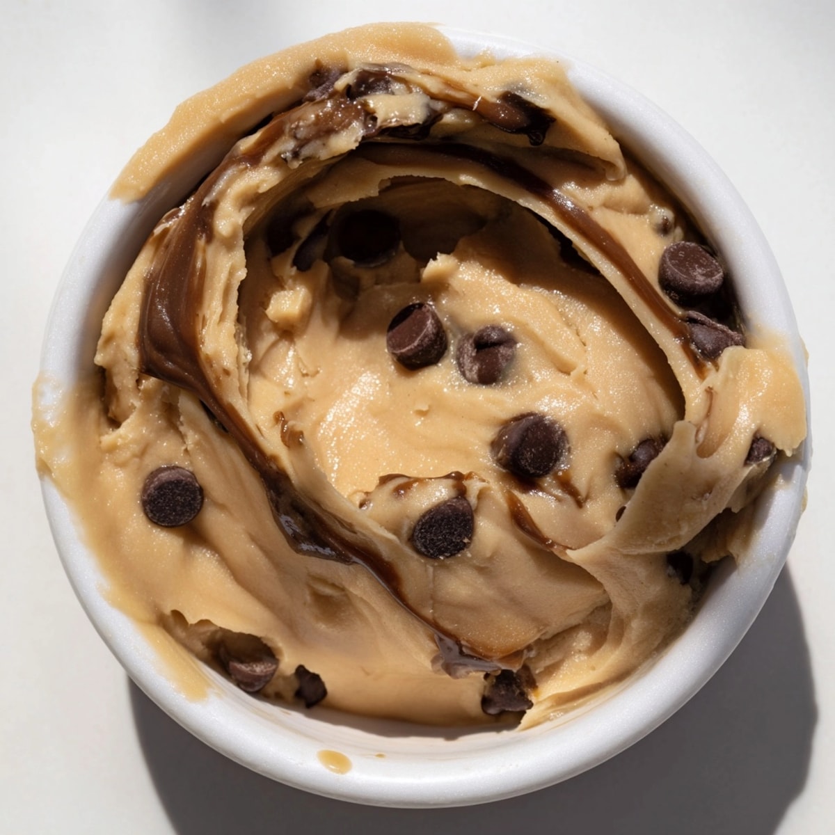 Creamy, healthy Chickpea Cookie Dough, studded with chocolate chips ready to eat by the spoonful.