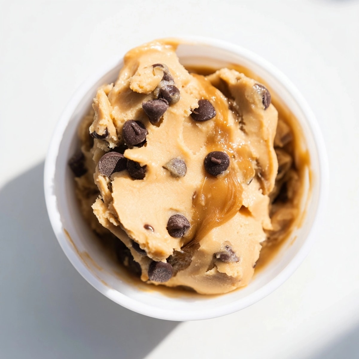 Golden-brown Edible Chickpea Cookie Dough, a creamy, healthy dessert alternative perfect for a snack.