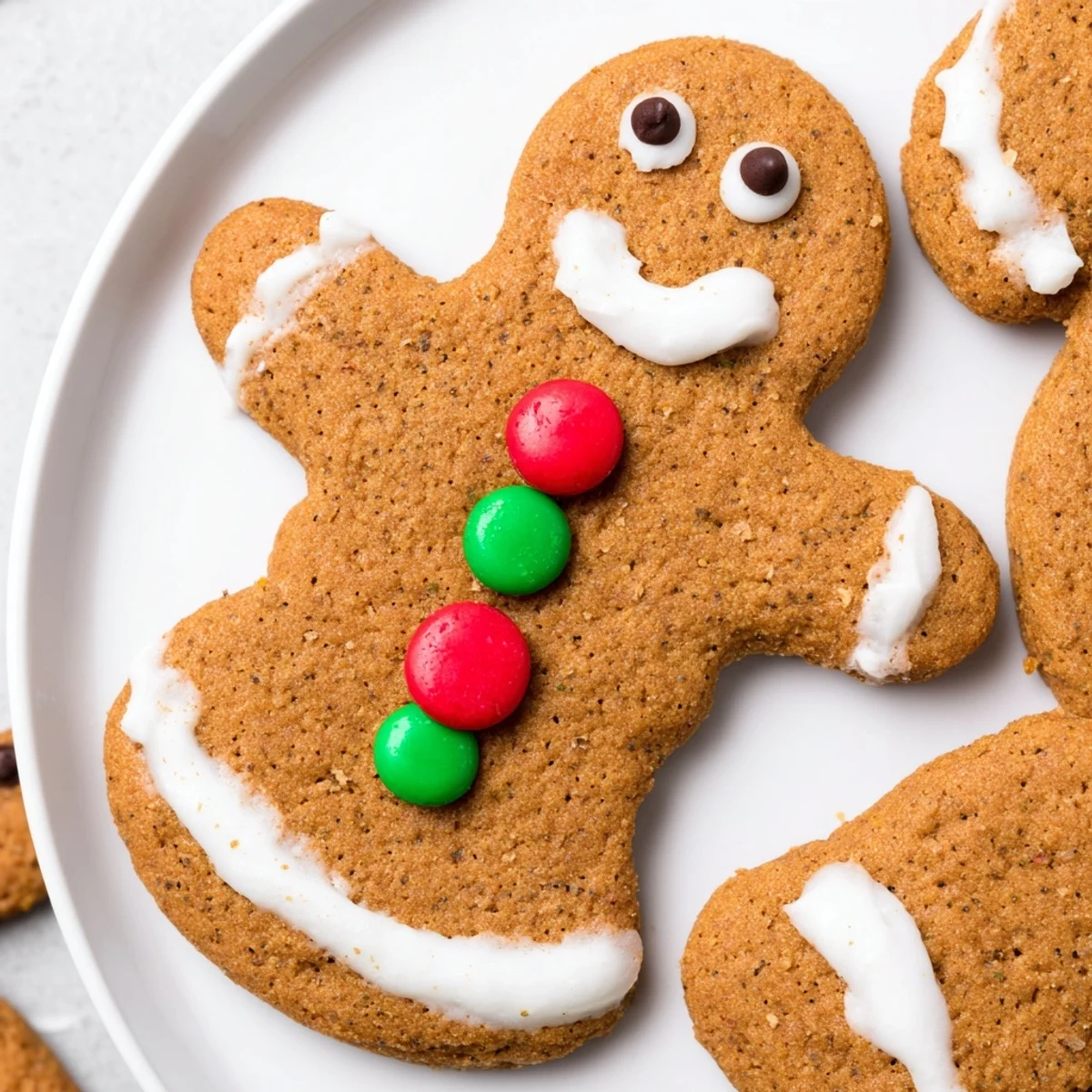 Decorated Gingerbread Man Cookies, showing colorful icing details, a delicious, classic holiday dessert recipe.