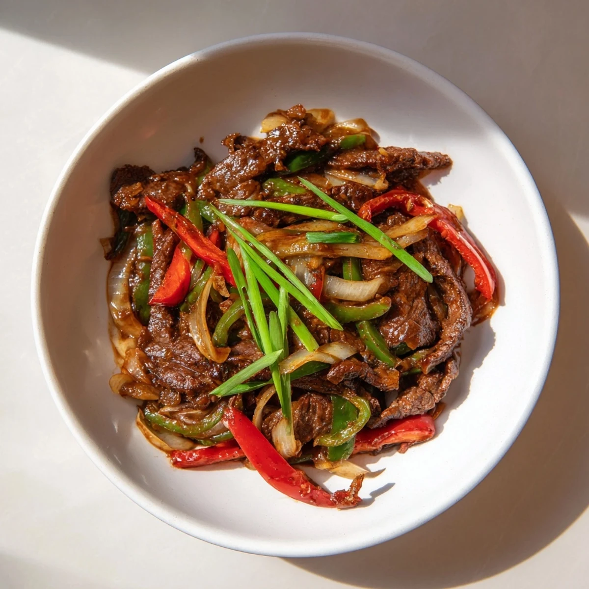 Tender beef slices mingle with colorful peppers in this delicious Spicy Beef and Pepper Stir Fry.