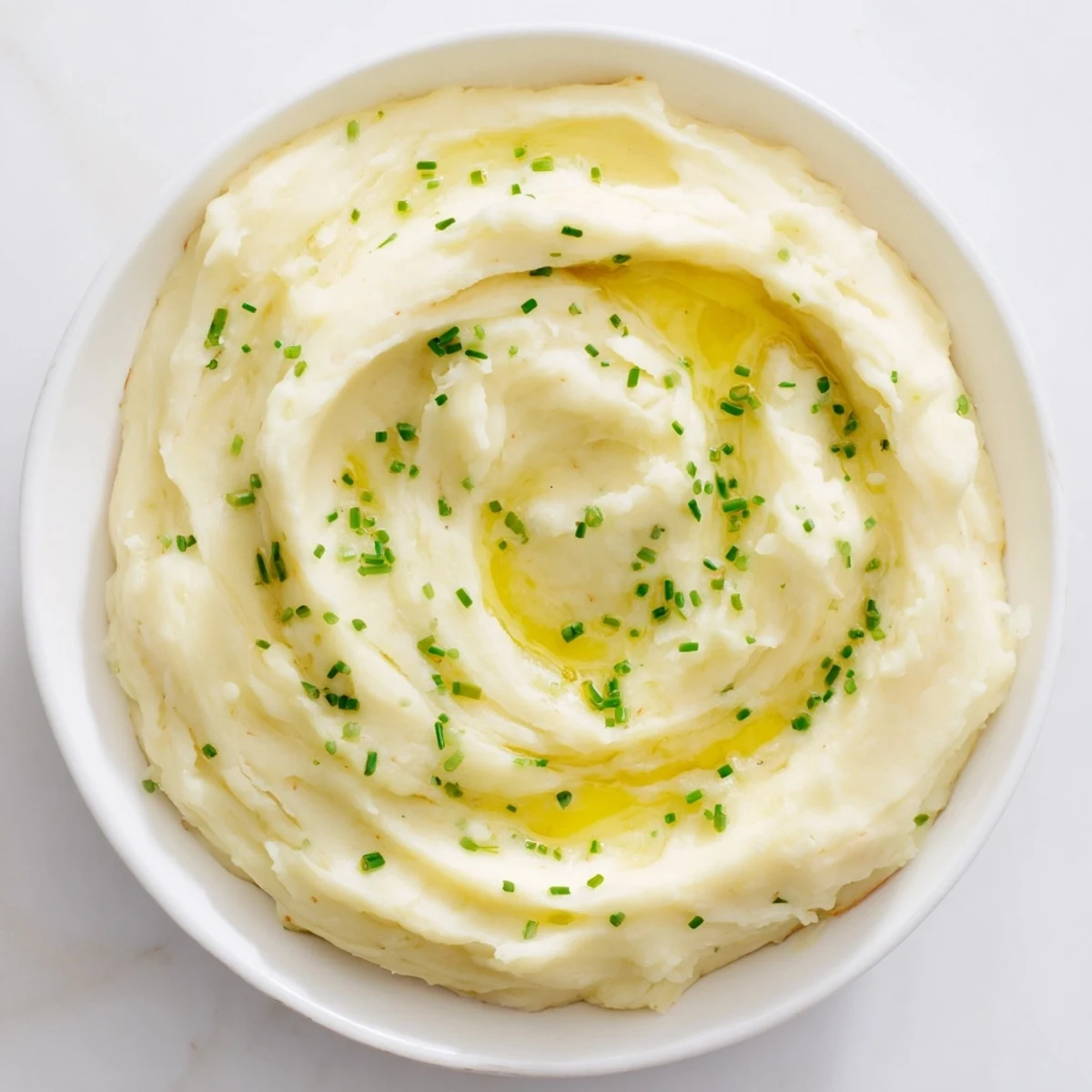 Creamy Garlic Mashed Potatoes, steaming hot, a classic American side dish with amazing flavor.