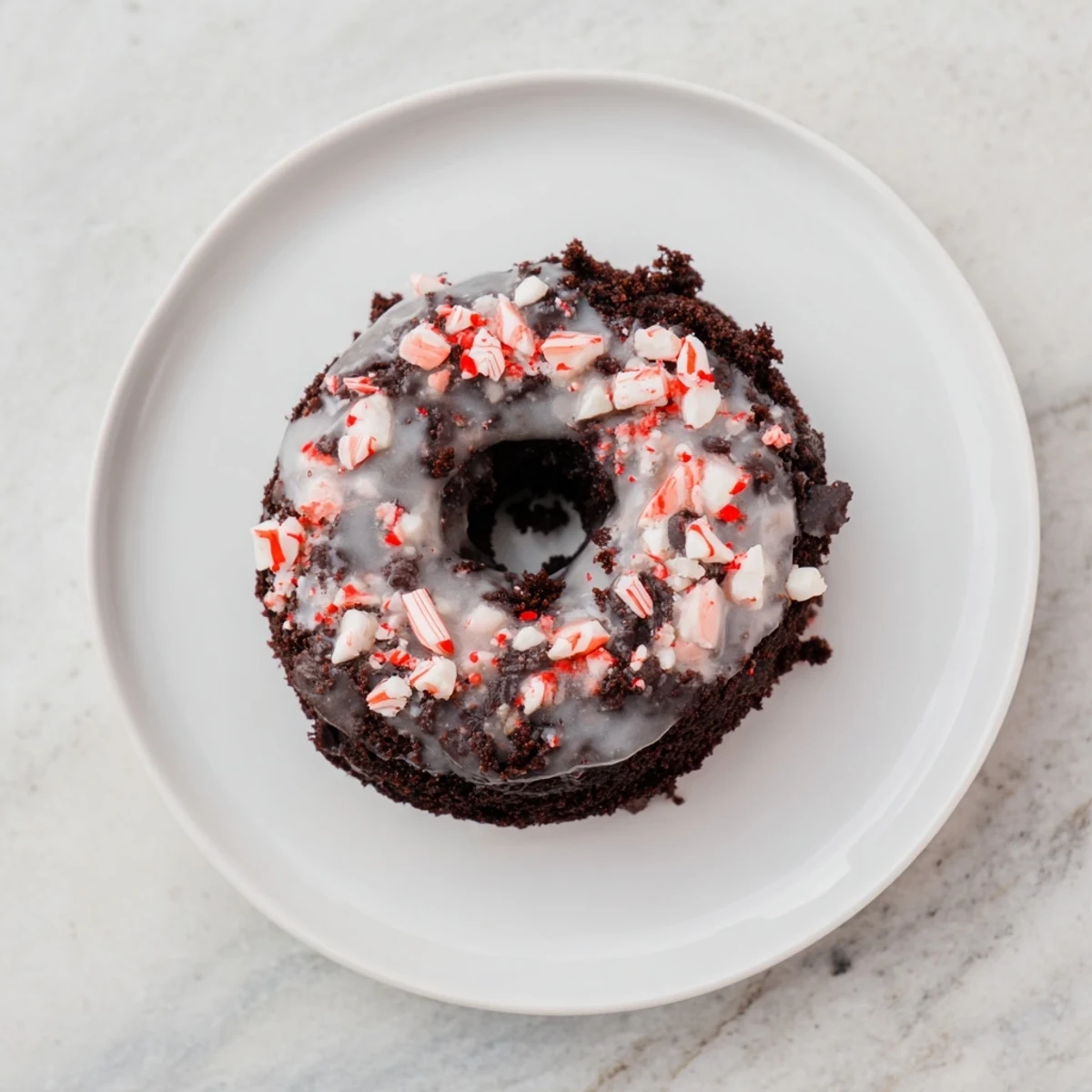 Close-up of freshly baked Peppermint Mocha Donuts, showcasing their rich, chocolatey texture.