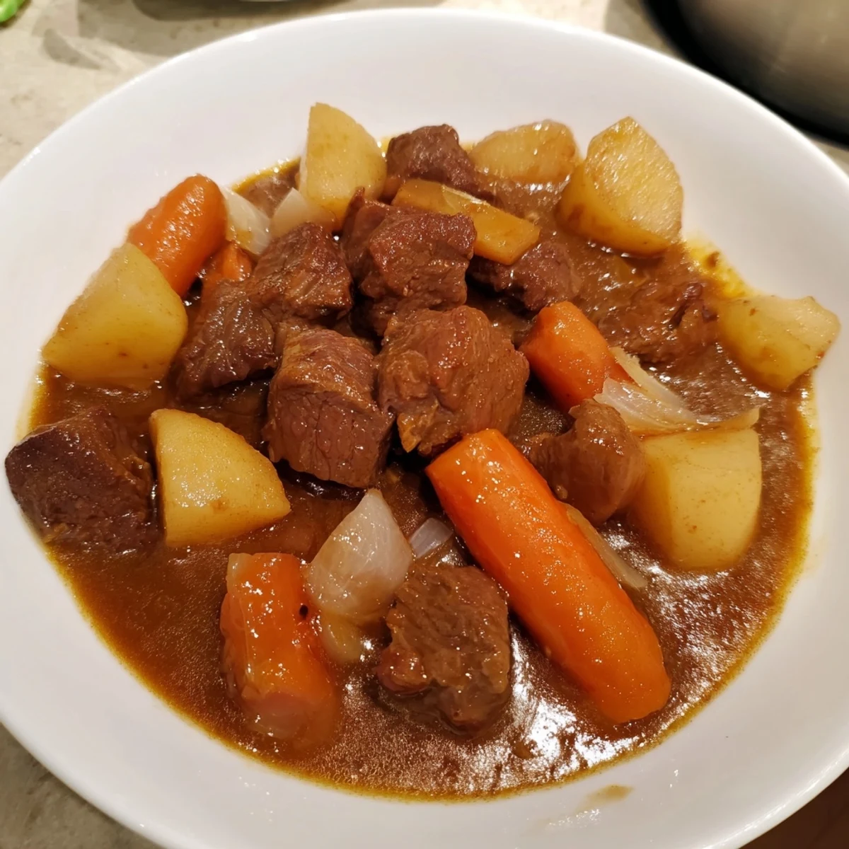 Hearty Beef Stew with Root Vegetables, showcasing perfectly cooked beef and tender, colorful vegetables in a rich broth.