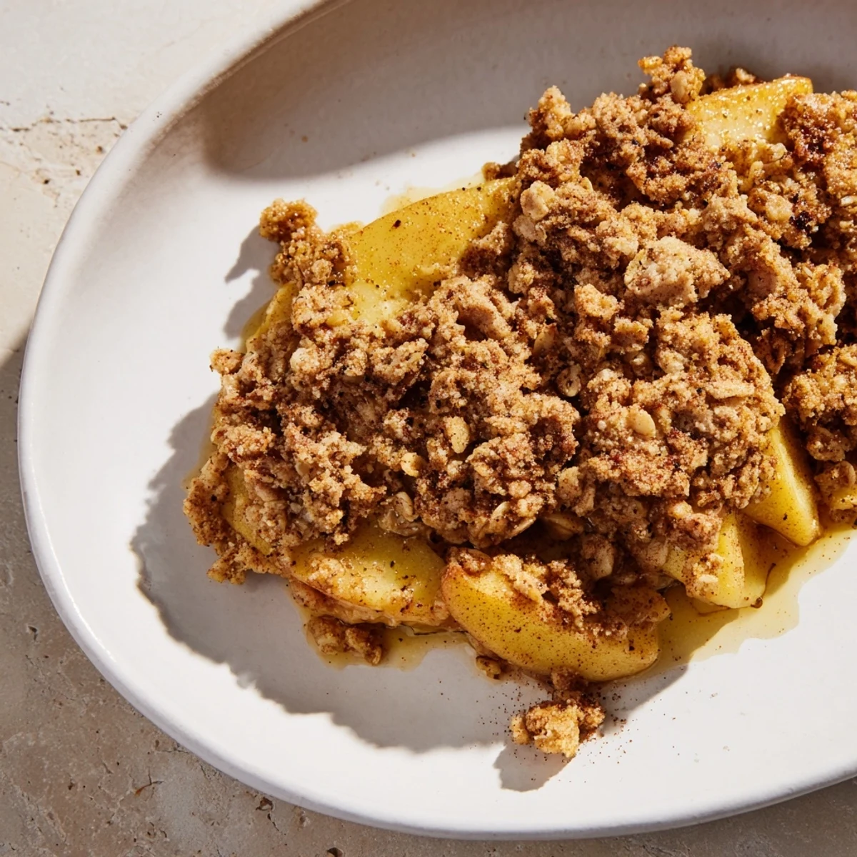 Golden, bubbly Apple Crisp, a classic dessert with tender apples under a sweet oat topping.