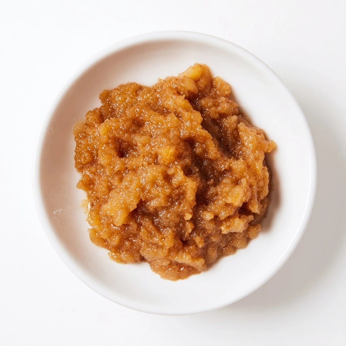 Creamy Spiced Apple Sauce, a warm, fragrant autumn treat seasoned with cinnamon and nutmeg.
