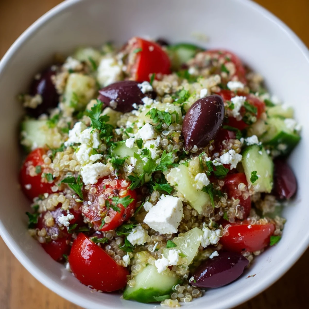 Fresh Mediterranean Supper Salad with chickpeas, feta, and olives tossed in a lemony dressing.