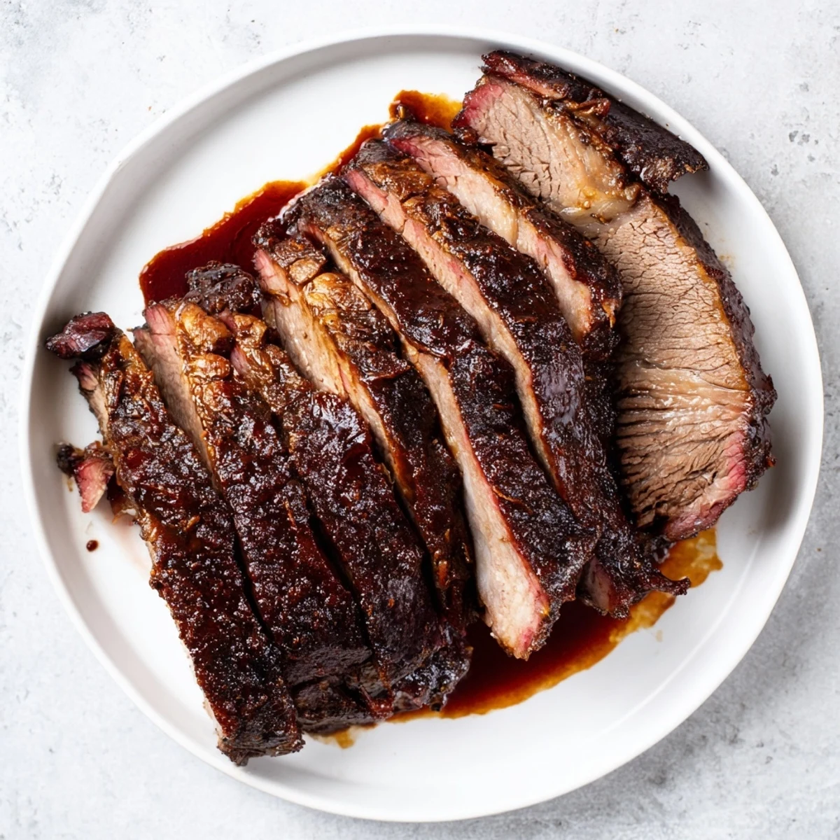 Fork-tender Slow Cooked Beef Brisket with BBQ Sauce, smoky and saucy, ready to serve from the slow cooker.