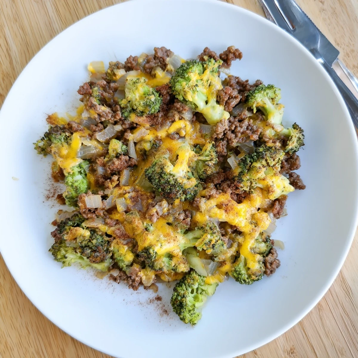 Stir-fried broccoli meets juicy beef in this savory Keto Hamburger Broccoli Skillet, finished with a spoonful of cream cheese.