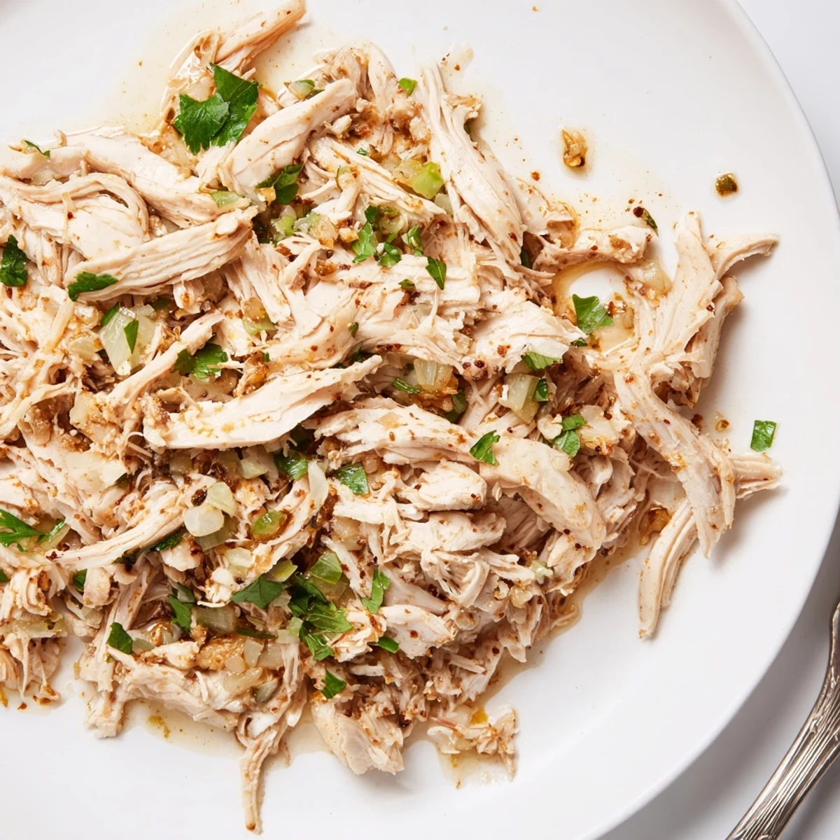 Shredded into warm tortillas, Slow Cooker Cilantro Lime Chicken bursts with tangy aroma  